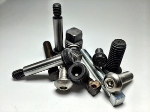 brown bolt and nut screws